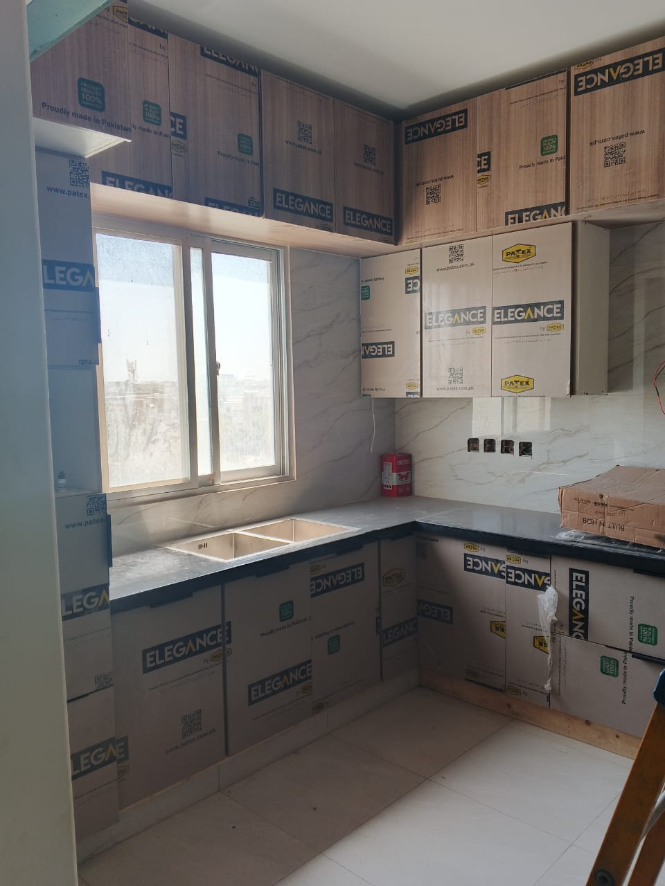 Modular kitchen cabinetry in a Karachi home
